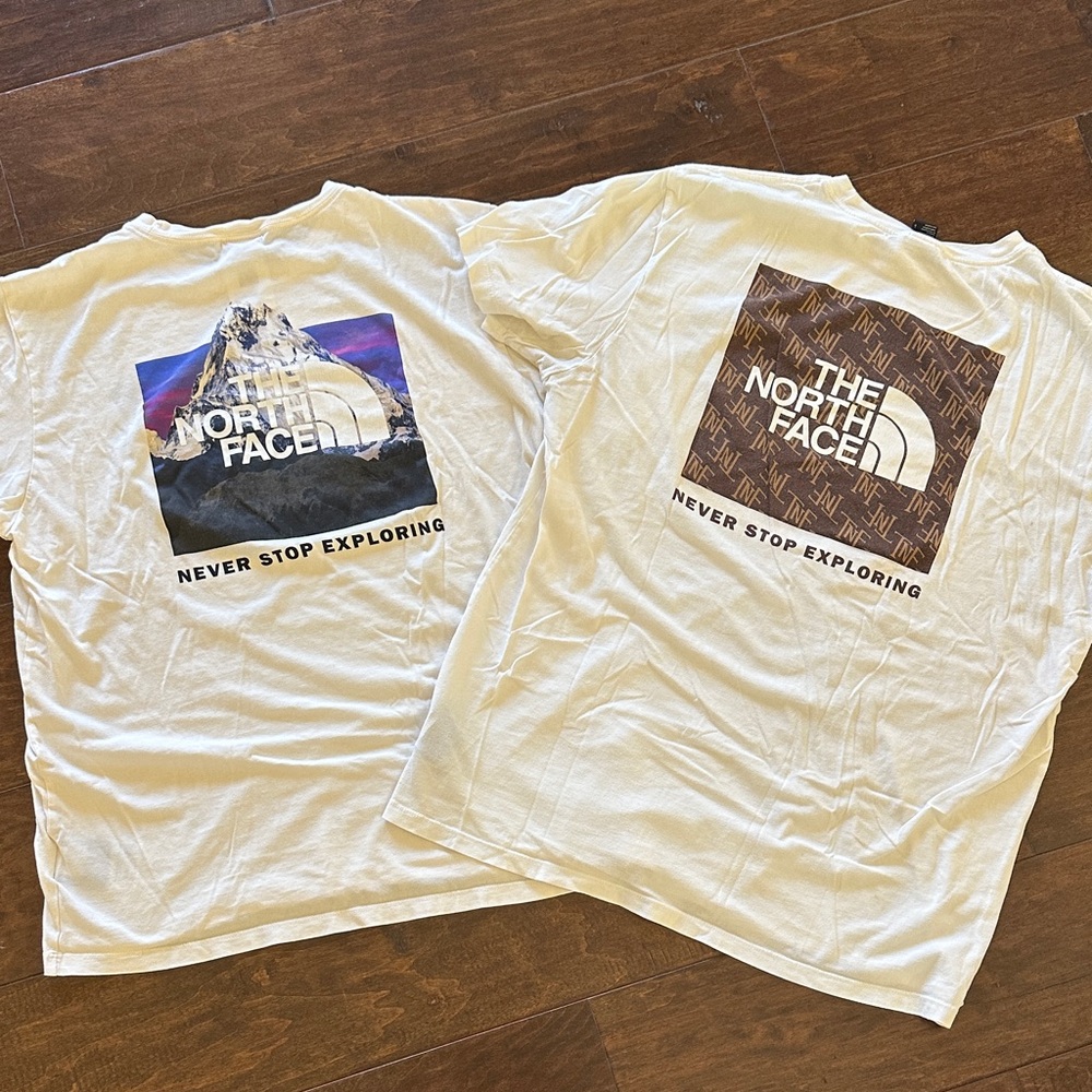 The North Face - Set was of 2 Men’s White Adventure T-shirts. Size L